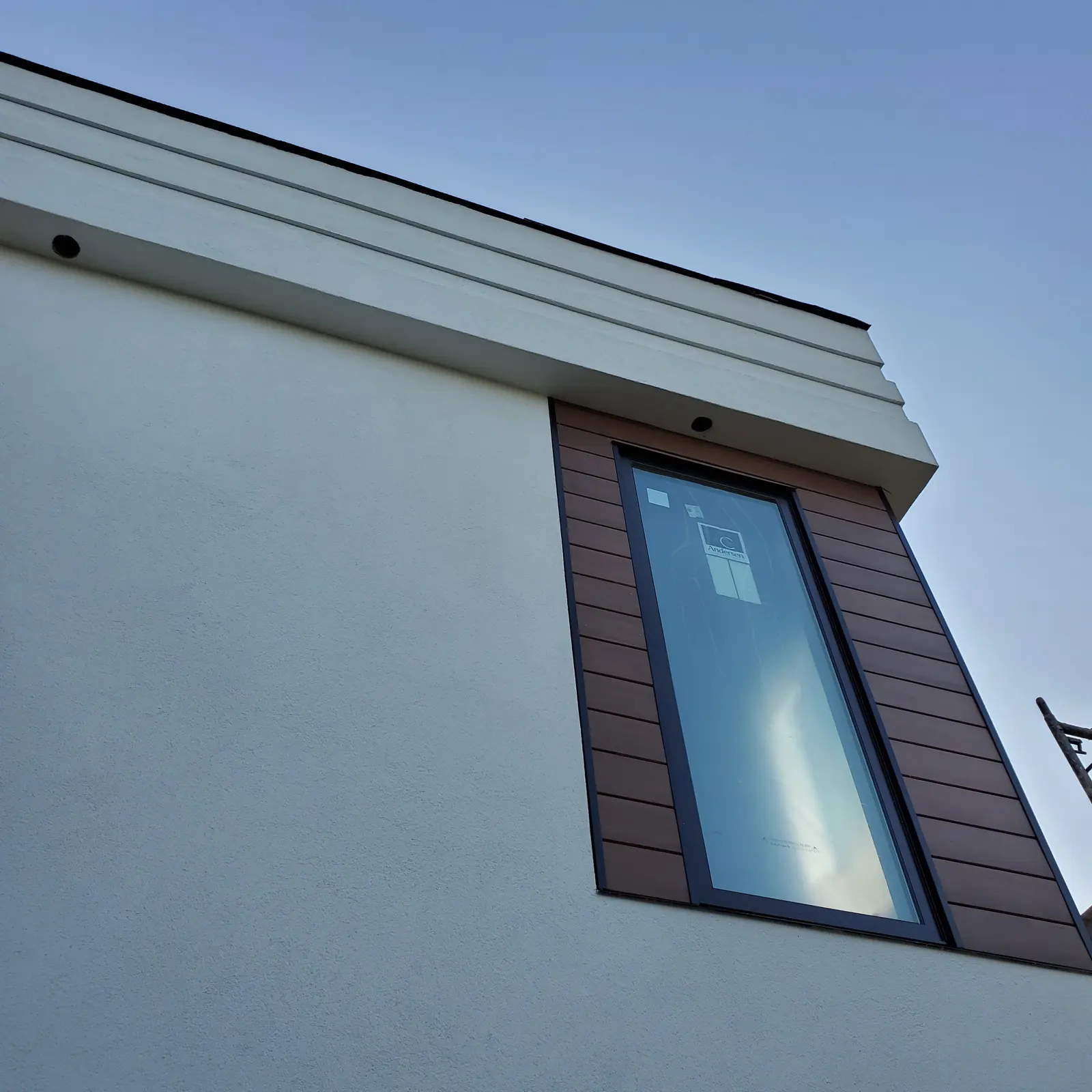 Faux wood finish detail on a Niagara Region exterior